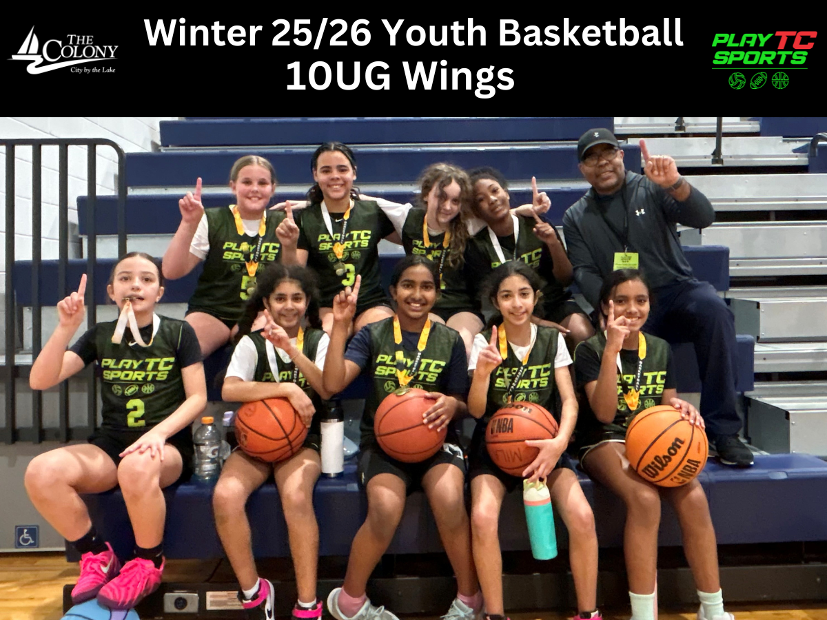 Female high school basketball team playing game
