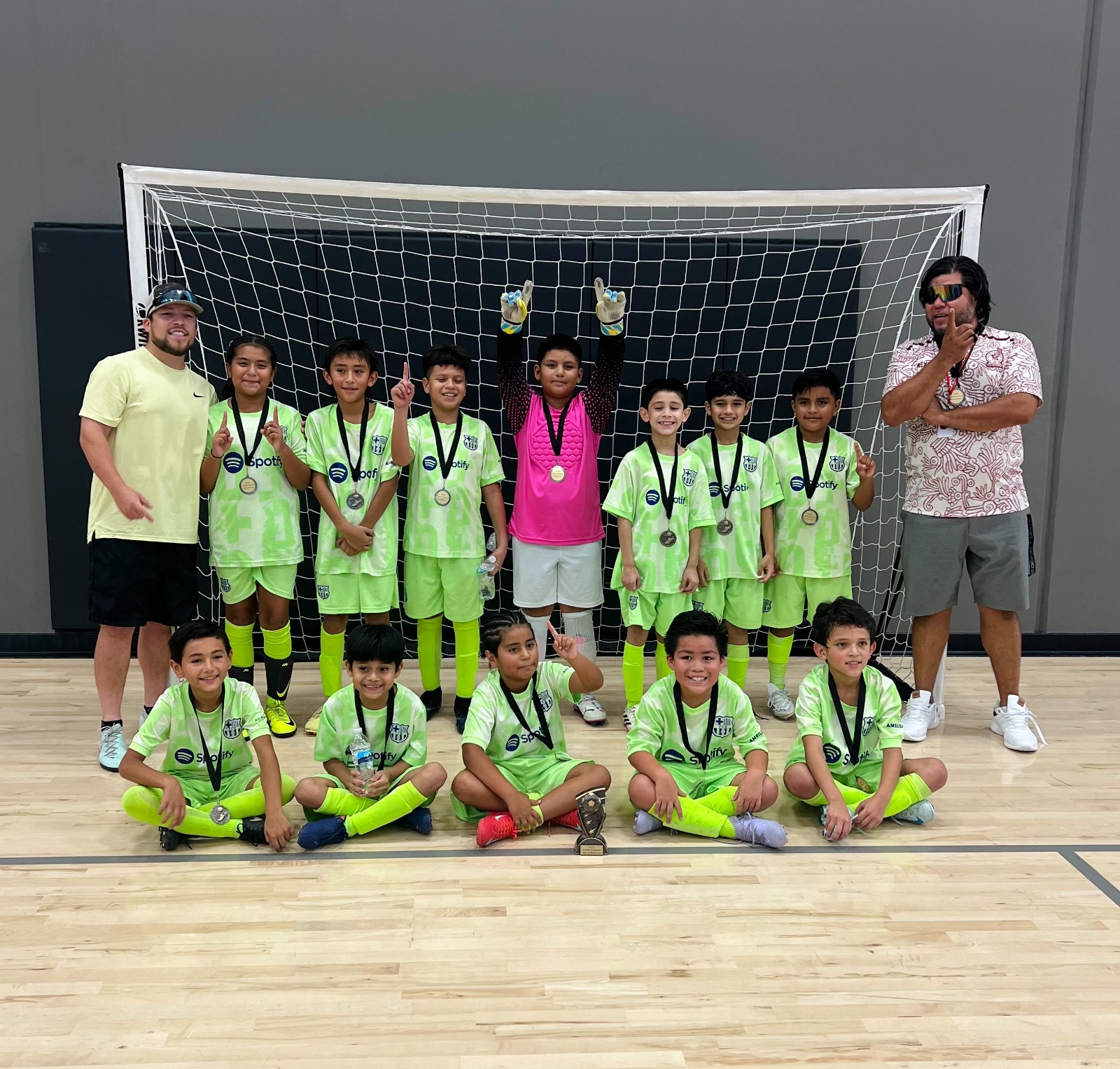 Female high school basketball team playing game