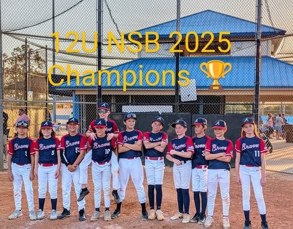 Female high school basketball team playing game