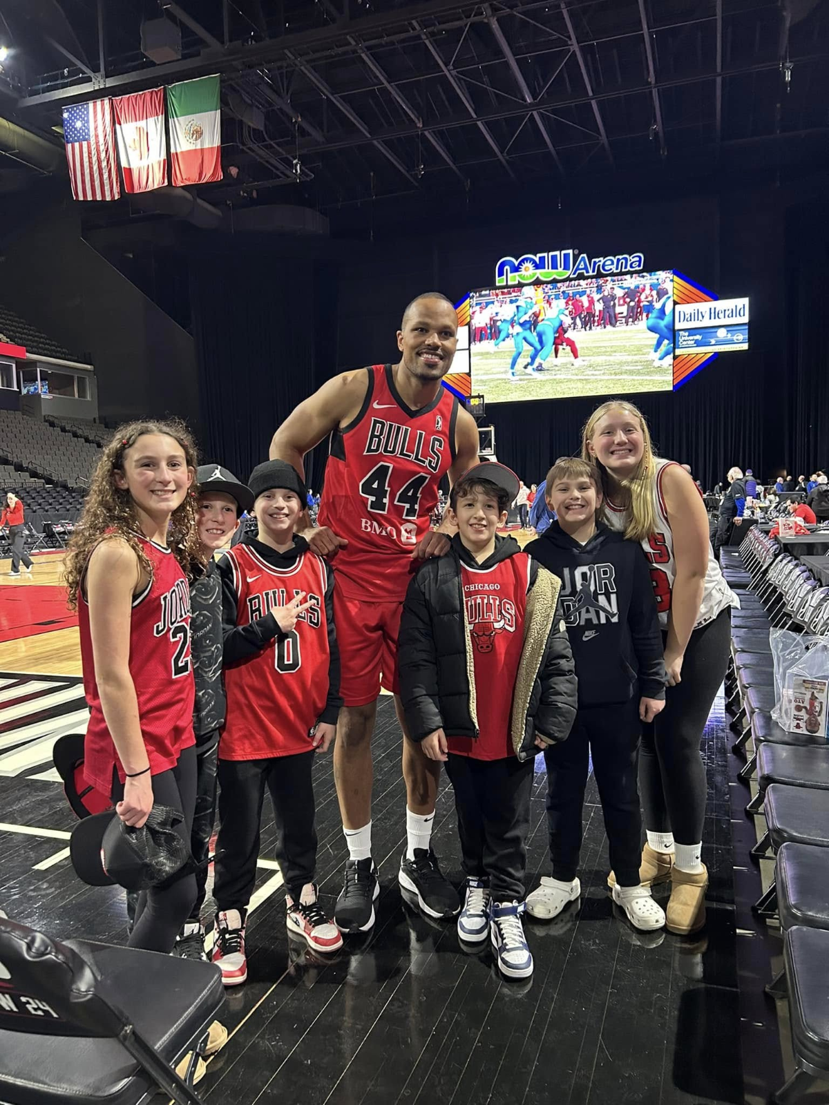 Female high school basketball player shooting basket