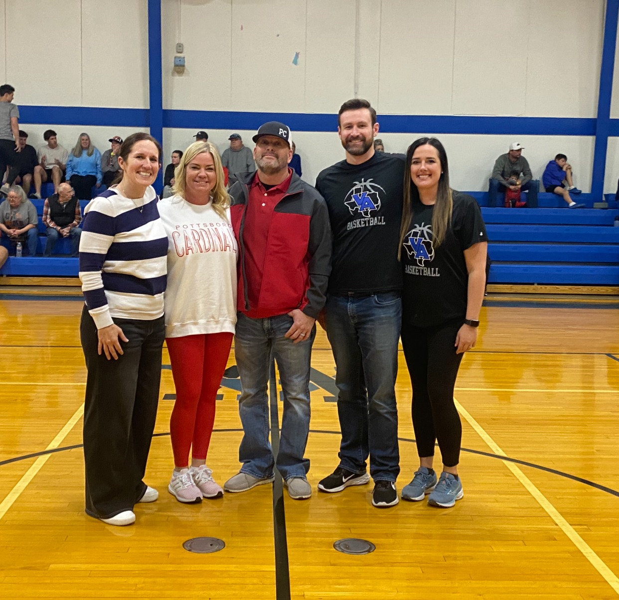 Female high school basketball team playing game