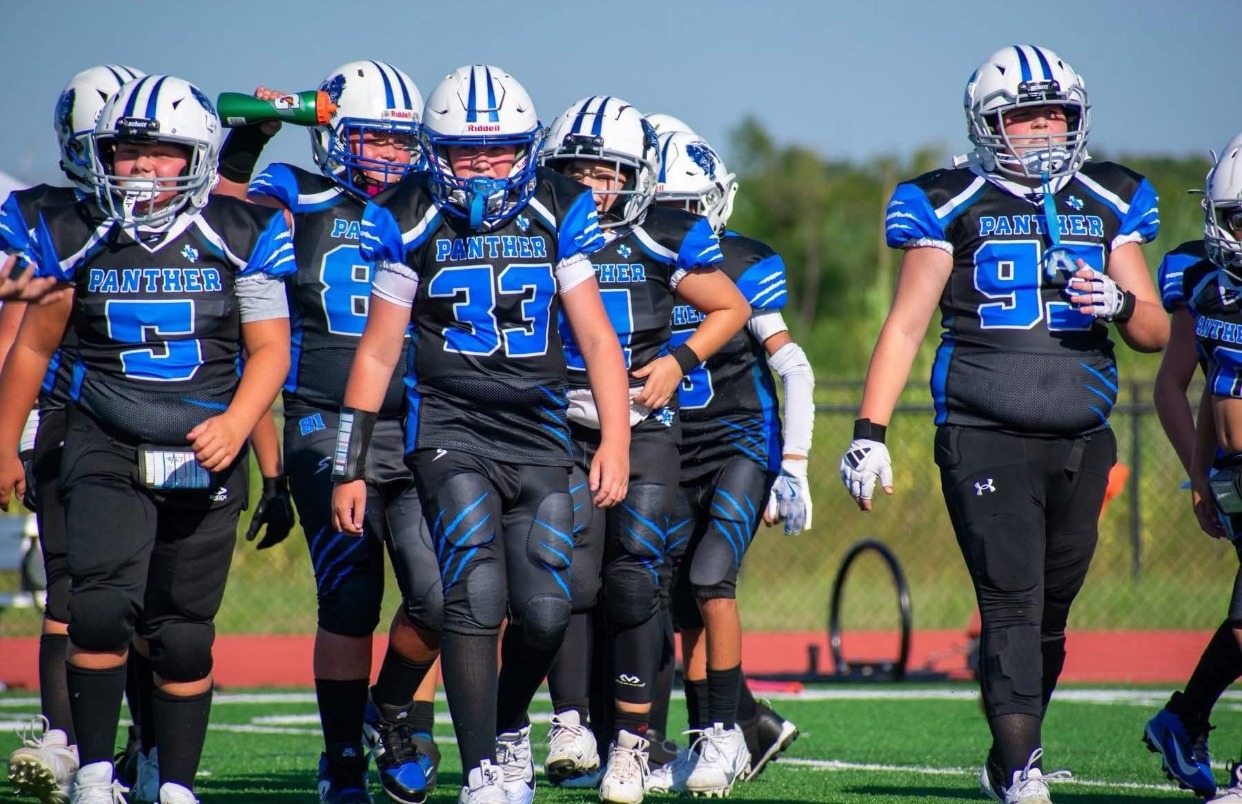 Youth playing baseball