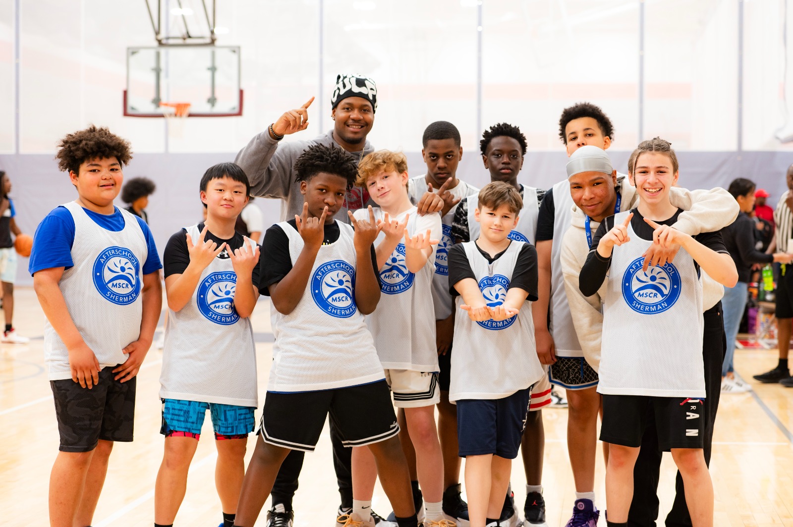 Female high school basketball team playing game