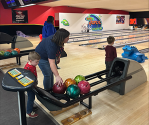 Presentational Mom & Son Bowling 2026 visual